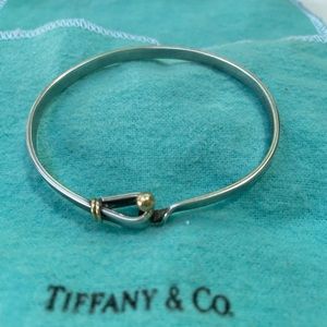 Tiffany & Co. Two tone hook bangle.